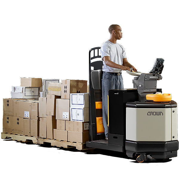 Operator moves a load using Crown's PC series centre control pallet truck