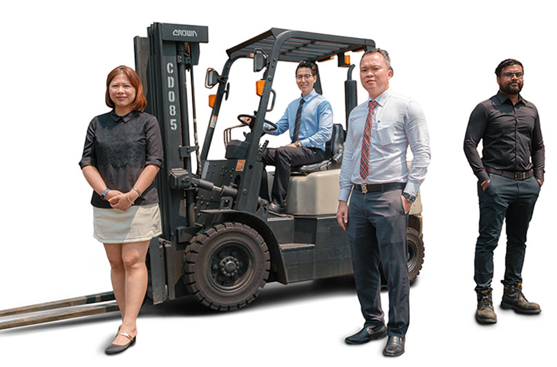 Group of Crown employees surrounding a C-5 internal combustion forklift