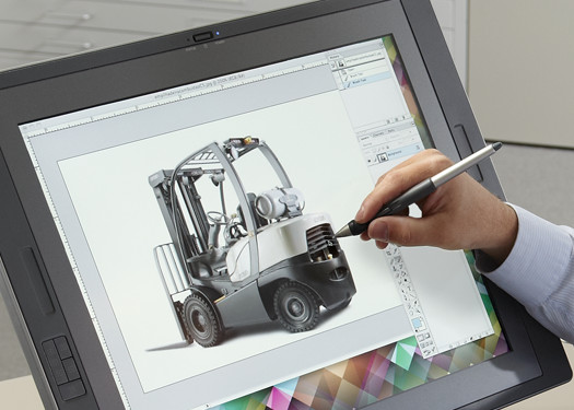 Designer works on a digital image of a Crown lift truck.