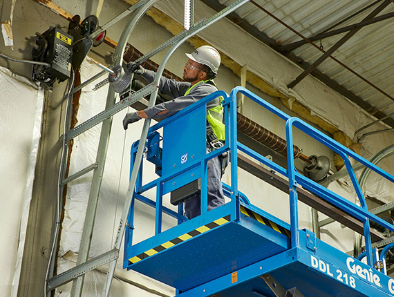 Worker operating machinery safely