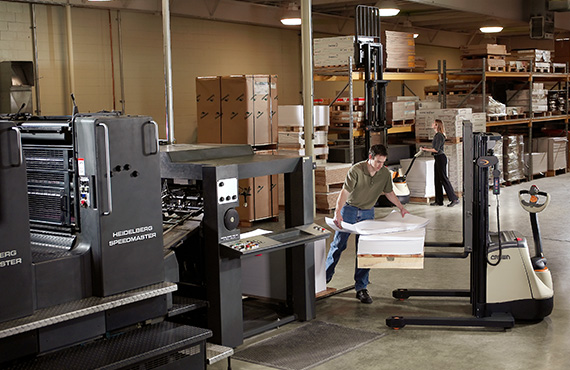 The M Series straddle stacker can be used in a pallet racking application