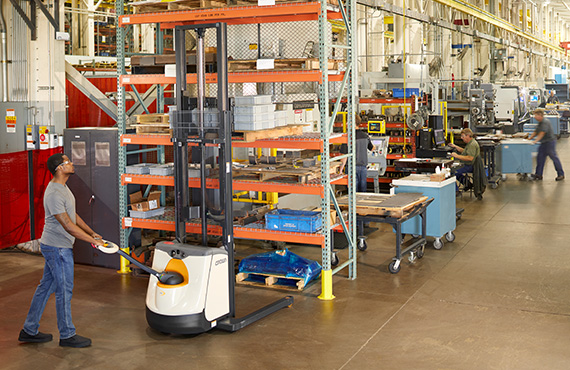 The M Series straddle stacker can be used in a pallet racking application