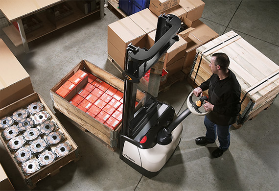 Crown's WF series fork-over pallet stacker is easily maneuvered in tight spaces