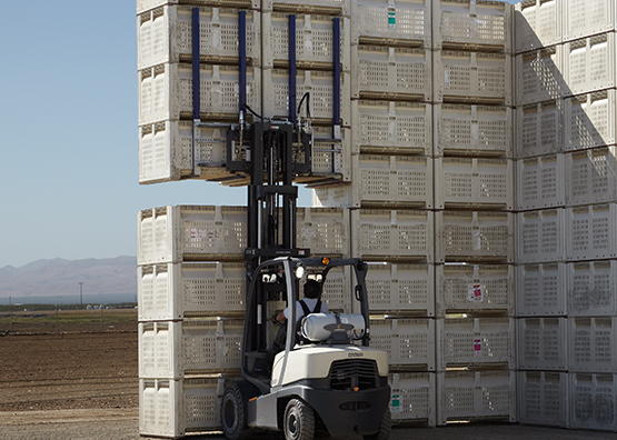 Wide carriage C-5 moving a large load