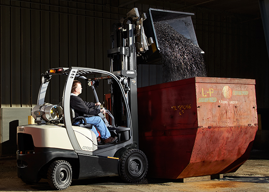 C-5 forklift in use using attachments